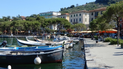 It's lovely - the long waterfront includes large shaded areas and some good little bars and restaurants 