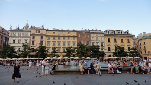 The busy square is a meeting place for locals and a resting place for tired tourists