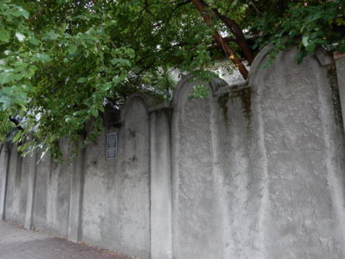 To reinforce the message of the fate that awaited its inhabitants, the ghetto wall was built in the shape of tombstones
