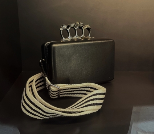 Here's a knuckle-duster handbag for the man who has everything.