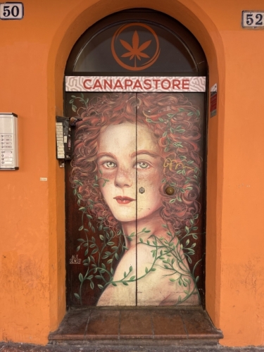 No need to guess what's behind this door. Recreational use of cannabis has been decriminalised here and Canapastores are popping up in many Italian cities.