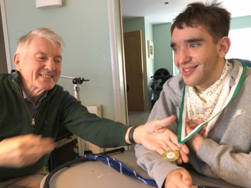 Though this time, we were lucky to catch Alex between sporting commitments; Dad, Declan, admiring Alex’s latest football award (Gaelic football, of course!)
