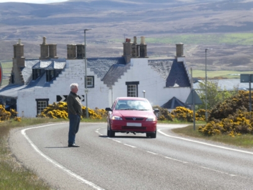The first thing we noticed was a farmer standing in the middle of the road; he seemed relaxed enough, whistling a little tune, but clearly something was amiss