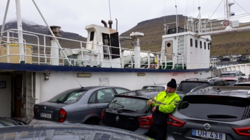 The only option is the ferry that runs a few times a day; it takes a maximum of 18 vehicles - unless you're a local it's first come, first on (this man is a genius at boarding the cars in the most space-saving manner)